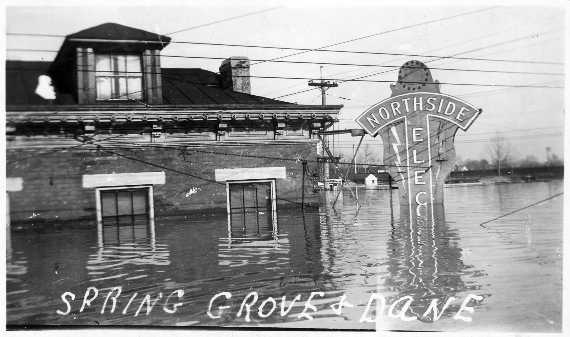 The 1937 Ohio River flood at Spring Grove & Dane in Northside Cincinnati — the historic Northside Electric building that became Northside Yacht Club