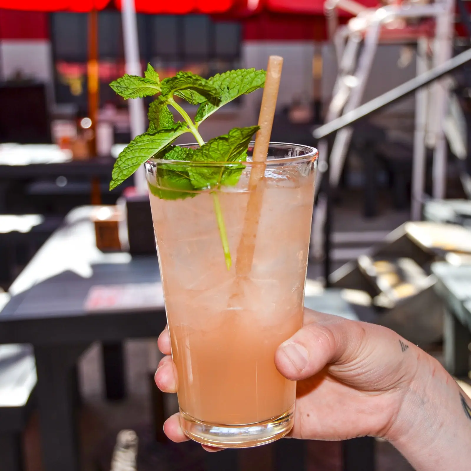 NSYC bartender mixing a craft cocktail