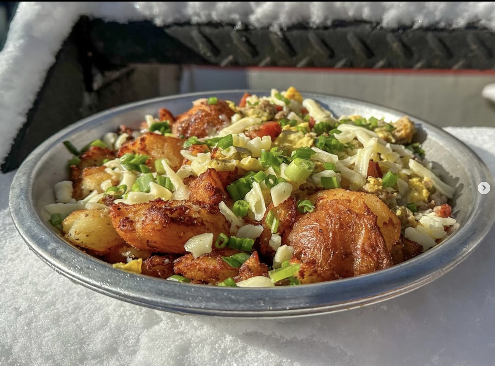 Hawt Mess — pork sausage, pork belly, scrambled eggs, smashed red potatoes, peppers, onions, cheddar and scallions