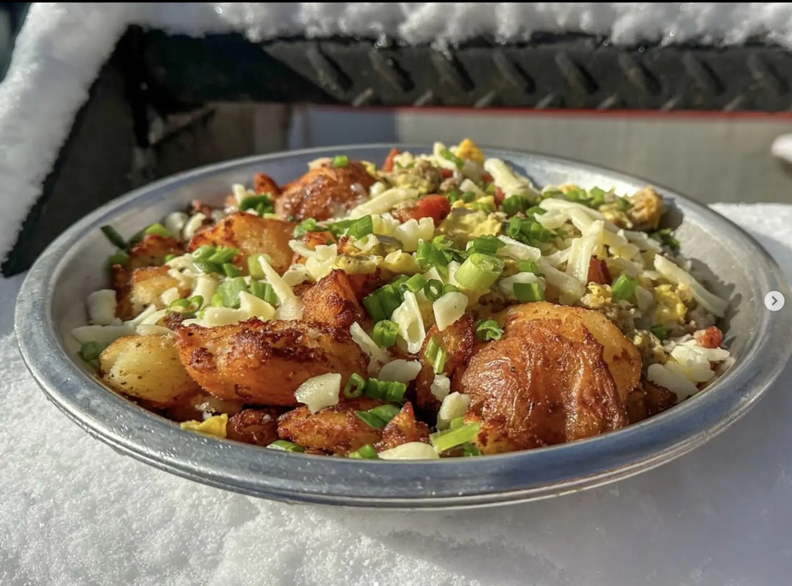 Hawt Mess — pork sausage, pork belly, scrambled eggs, smashed red potatoes, peppers, onions, cheddar and scallions