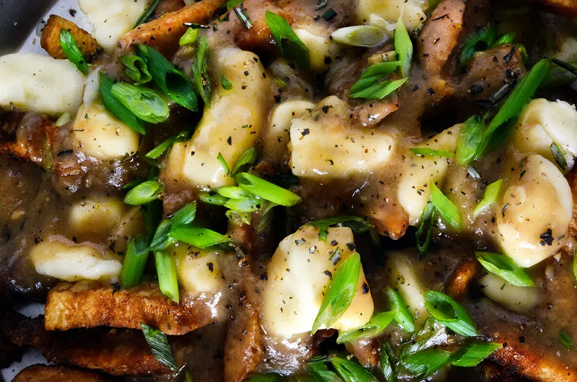 Poutine close-up — Urban Stead cheese curds and brown gravy