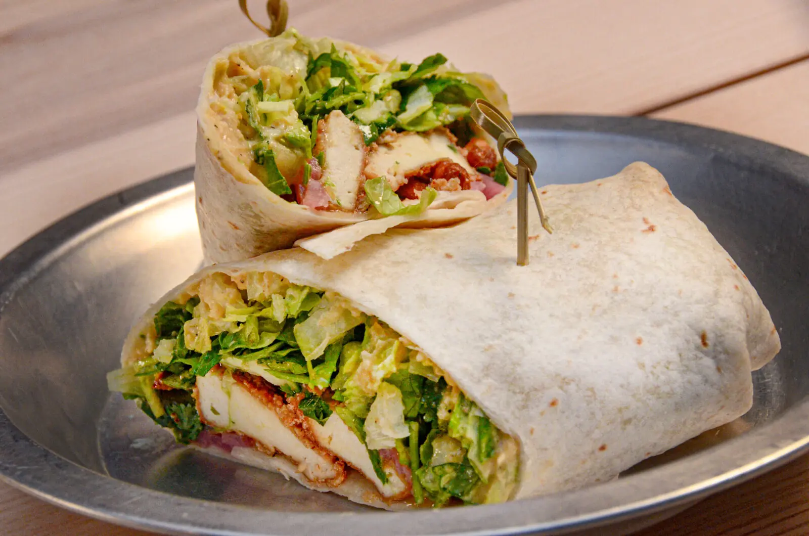 Veggie Delight Wrap — fried CinSoy tofu, garlic hummus, cucumber and pickled red onion