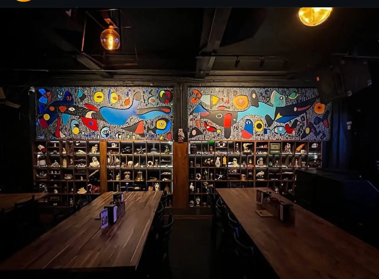 The Miró-inspired mural above the curio wall in the NSYC venue